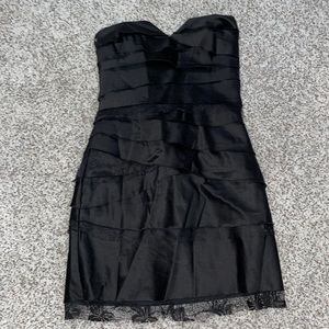 Strapless black dress with lace ruffle